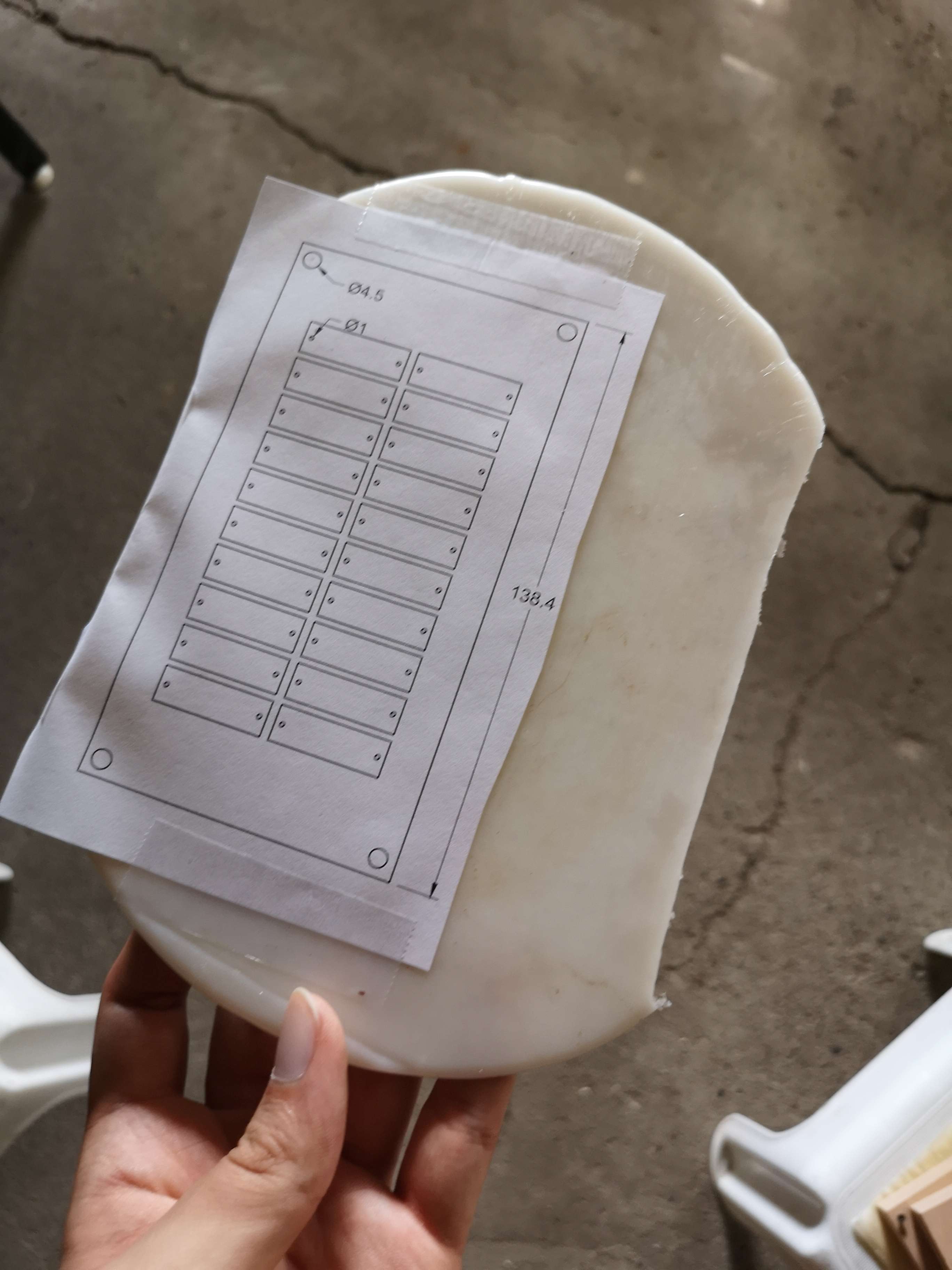plastic board with printout of board design