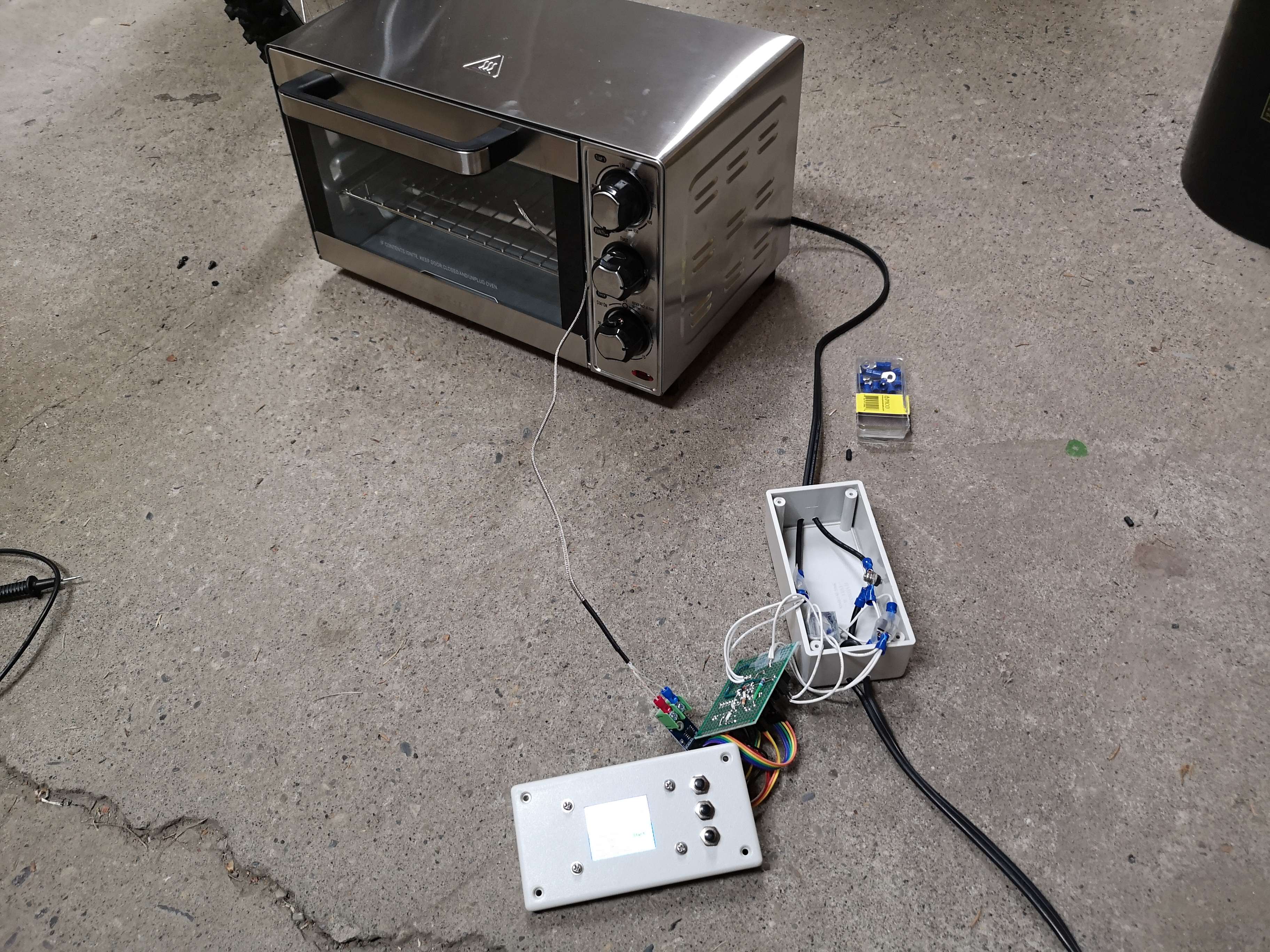 A bunch of parts and stuff on the floor